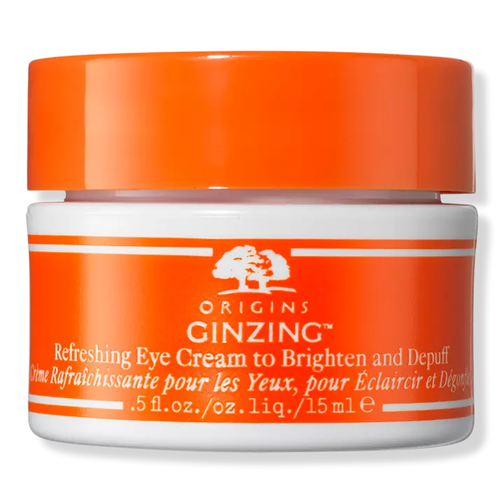 Crema para ojos con vitamina C y niacinamida Ginzing para iluminar y deshinchar ORGINS